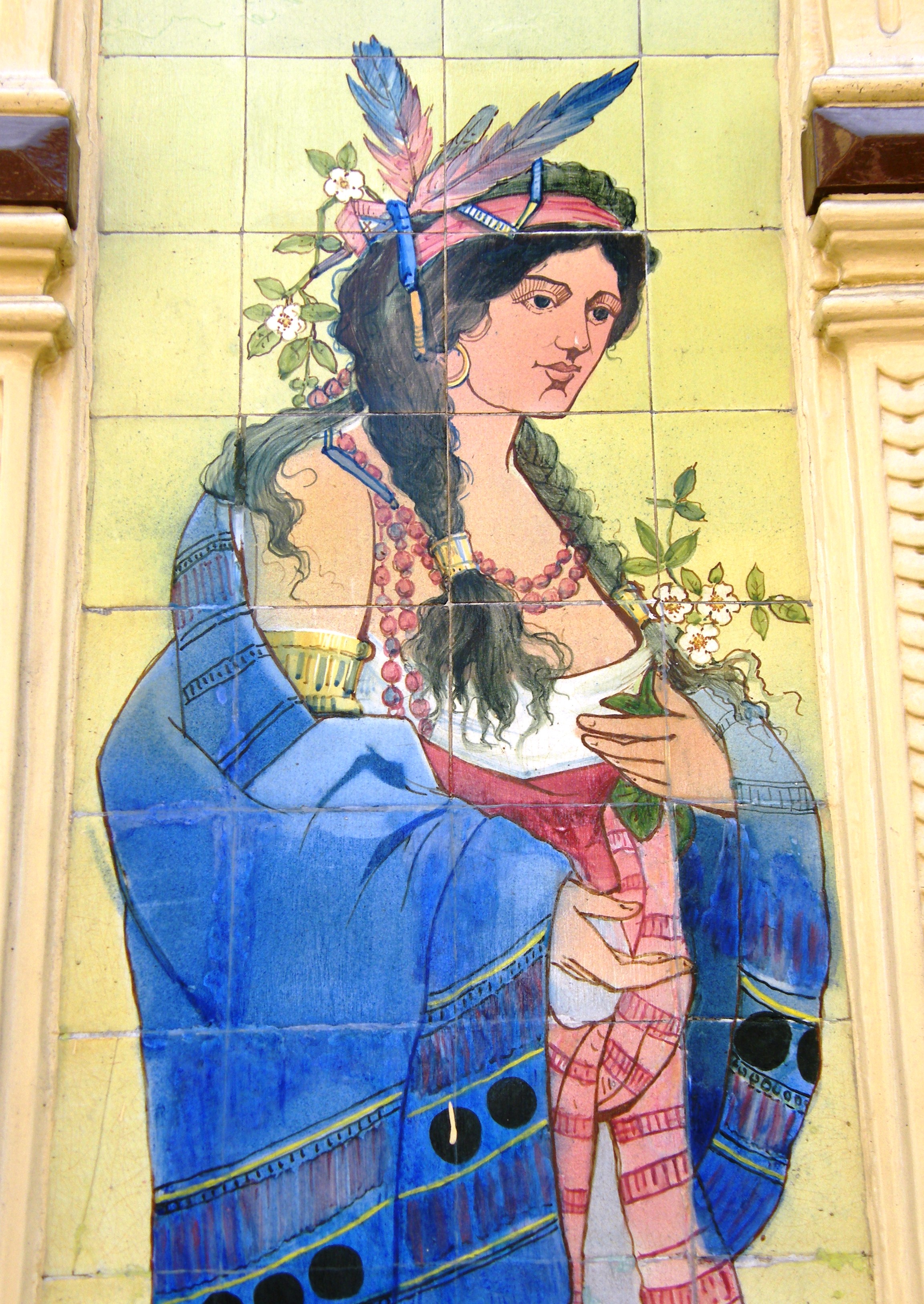 Detail of tile panel on a shopfront in Porto made by the local Carvalhinho Factory in 1917