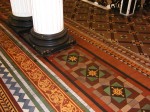 Hall way with encaustic tiles made by Maw & Co at the Leeds Club