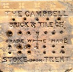 The reverse of a Campbell encaustc tile