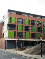 Crown Street Buildings built in 2004  situated behind the Corn Exchange. All the sides of the building are decorated with colourful faience.