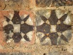 Detail of two inlaid tiles at Kirkstall Abbey