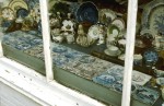 Delft tiles in the window of an antique shop in Cambridge