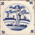 Mid 18th century  Dutch tile made in Harlingen depicting  a shepherd and his flock and spider's head corner motifs