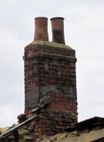 Brick chimney stack with late 18th century hand-made chimney pots at Buslingthorpe Vale, Leeds