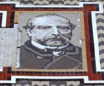 Tiled portrait of Miguel Nolla on the facade of his house, the Palauet, next to his factory in Meliana.