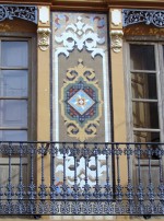 Detail of the facade of a house in Meliana dated 1905 decorated with Nolla tiles.