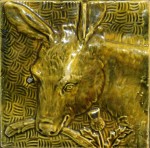 Press-moulded Burmantofts tile showing a donkey, c. 1885