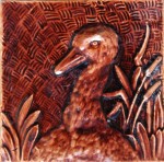 Press-moulded Burmantofts tile showing a duckling, c. 1885