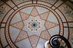 Circular mosaic floor made from small dust-pressed clay tesserae designed by the architect Owen Jones and manufactured by Minton & Co. in c. 1847 is still in situ at Little Woodhouse Hall, Clarendon Road, Leeds